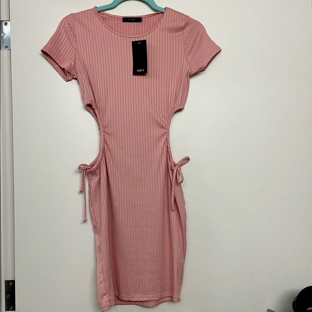 Body con cut out blush dress.